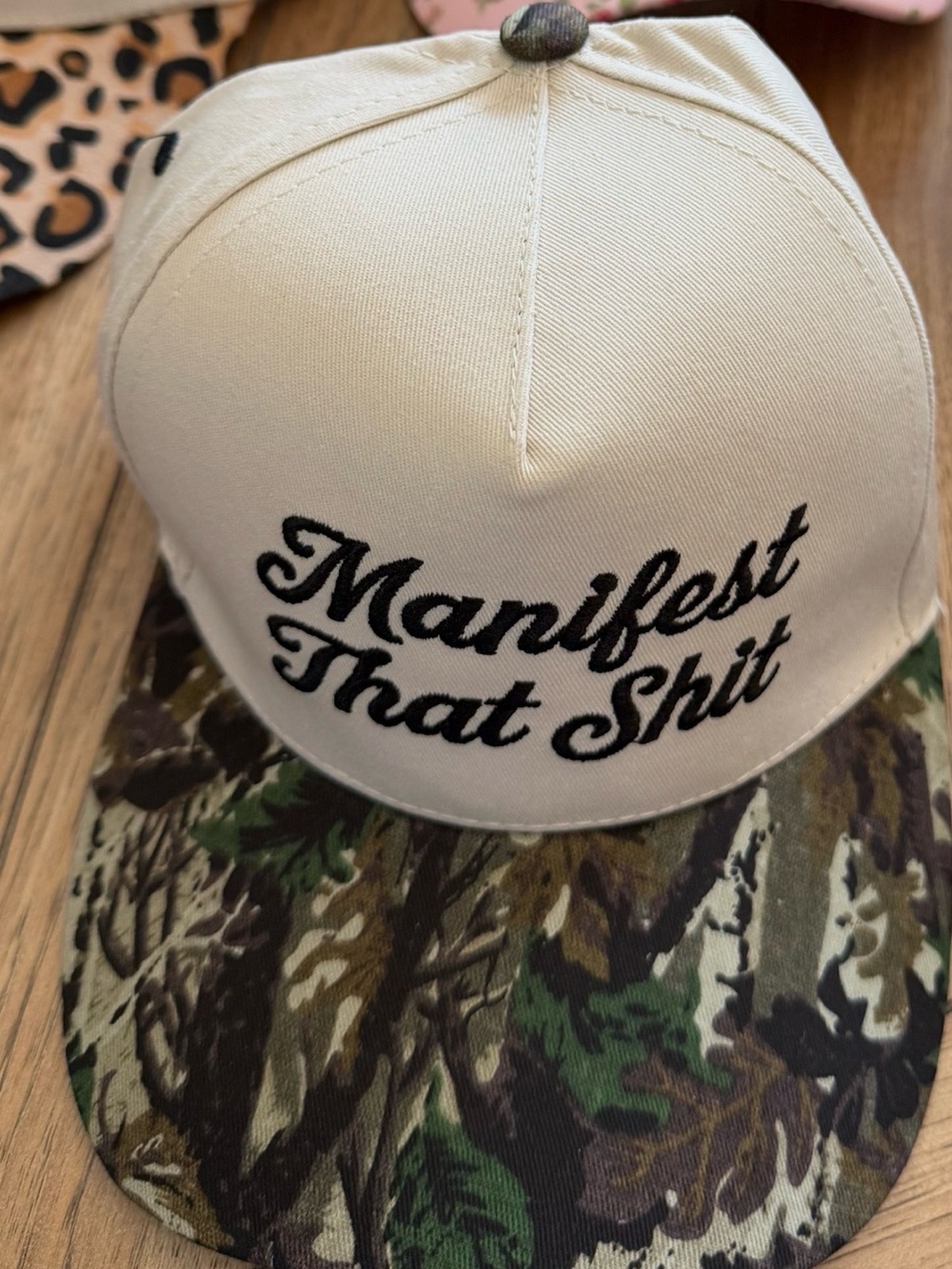 Unk White Cap with Camouflage Brim - "Manifest That Shit" Embroidery
